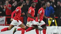 Sebagai tim promosi di Liga Inggris musim ini, Nottingham Forest melakukan belanja besar-besaran dengan banyak mendatangkan pemain baru dari berbagai negara, seperti para pemain asal Afrika. Tercatat Dari total 39 pemain dalam skuad Nottingham Forest musim 2022/2023 ini, Forest memiliki 7 pemain Afrika yang menjadi terbanyak kedua setelah pemain lokal Inggris sendiri yang berjumlah 13 pemain. Berikut ketujuh pemain asal Afrika tersebut. (AFP/Paul Ellis)