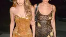 Tak hanya itu, sang adik, Bella Hadid pun tampil cantik dengan dress motif leopard. (Getty Images/Cosmopolitan)
