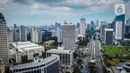 Foto udara gedung bertingkat di kawasan Sudirman, Jakarta, Rabu (8/4/2020). Berdasarkan US Air Quality Index (AQI), pukul 12.00 WIB, kualitas udara Jakarta tercatat di angka 35 serta polutan parameter PM2,5 menempatkan Jakarta diperingkat 78 dengan kualitas udara sedang. (Liputan6.com/Faizal Fanani)