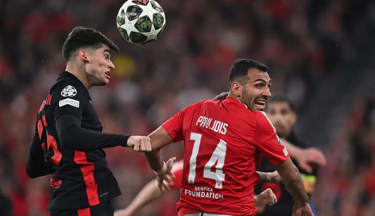 Bermain tandang, Barcelona sukses menaklukkan Benfica dengan skor tipis 1-0. (Patricia DE MELO MOREIRA/AFP)