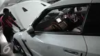 Seorang petugas sedang mengecek mobil mewah hasil sitaan tersangka kasus korupsi di Rumah Penyimpanan Benda Sitaan Negara (Rupbasan), Jakarta, Selasa (6/12). Dari puluhan mobil, terdapat mobil mewah yang harganya relatif mahal. (Liputan6.com/Helmi Afandi)