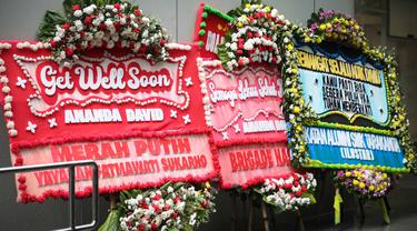 070917400_1677573883-Karangan_Bungan_untuk_DAVID-4