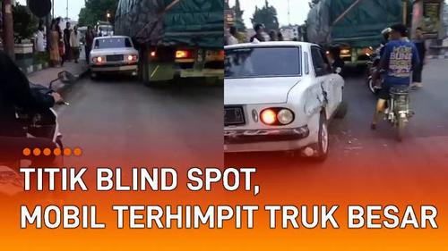 VIDEO: Titik Blind Spot, Mobil Terhimpit Truk Besar di Jalan