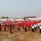 Sekitar 1.500 warga binaan pemasyarakatan (WBP) menari kolosal di Lapas Kelas I Tangerang, Banten, Kamis (15/9/2019). (Liputan6.com/Pramita Tristiawati)