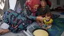 Kantor Media Pemerintah setempat pada Sabtu (26/7/2025) melaporkan, lebih dari 100 ribu anak di Jalur Gaza, Palestina, termasuk 40.000 bayi di bawah satu tahun, sedang menghadapi kematian di tengah kekurangan parah susu formula dan suplemen gizi. (Omar AL-QATTAA/AFP)