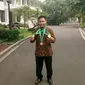 Atlet angkat besi Indonesia, Eko Yuli Irawan usai bertemu Presiden Joko Widodo atau Jokowi di Istana Merdeka, Jakarta, Kamis (8/11/2018). (Liputan6.com/Titin Supriatin)