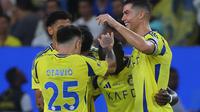 Pemain Al Nassr Cristiano Ronaldo pada laga kontra Al Orobah pada lanjutan Saudi Pro League hari Minggu (06/10/2024) dini hari WIB. (Fayez NURELDINE / AFP)