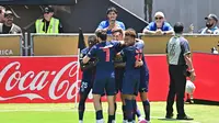 Pemain Paris Saint-Germain (PSG) merayakan gol yang dicetak Fabian Ruiz ke gawang Atletico Madrid dalam laga Grup B Piala Dunia Antarklub 2025 di Rose Bowl stadium, Los Angeles, Senin (16/6/2025) dini hari WIB. (Frederic J. Brown / AFP)
