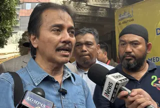 Pakar telematika Roy Suryo menghadiri pemeriksaan terkait kasus tudingan ijazah palsu Presiden ke-7 RI Joko Widodo (Jokowi). (Liputan6.com/Ady Anugrahadi)