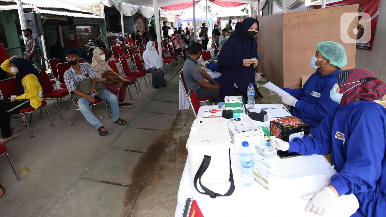 FOTO: Jelang Ramadhan, Pemprov DKI Jakarta Akan Tingkatkan Sentra Vaksinasi COVID-19