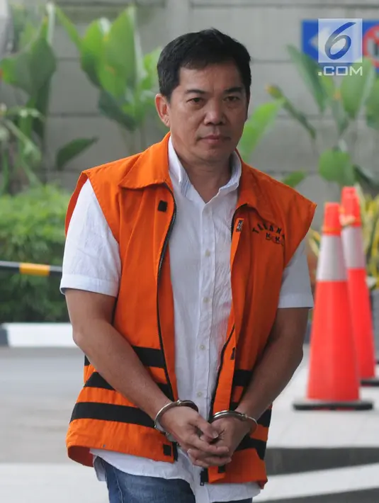 Ekpsresi pengacara Alfin Suherman selaku penyuap Aspidum Kejati DKI Jakarta Agus Winoto saat tiba di Gedung KPK, Jakarta, Kamis (4/7/2019). Alfin Suherman diperiksa sebagai tersangka terkait suap penangan perkara penipuan Sendy Perico. (merdeka.com/Dwi Narwoko)
