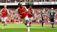 Striker Arsenal, Alexandre Lacazette usai mencetak gol ke gawang Burnley (Daniel -Leal Olivas/AFP)