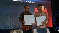 Kepala BSSN Letjen TNI (Purn) Hinsa Siburian dan CEO Huawei Indonesia Jacky Chen. Liputan6.com/Agustinus Mario Damar