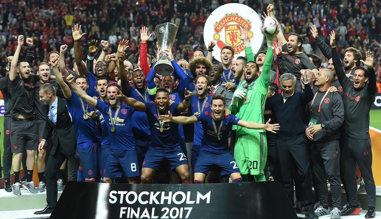 Manchester United adalah klub tersukses kedua dengan meraih 45 trofi utama yaitu 20 gelar liga, 12 Piala FA, 5 Piala Liga Inggris, tiga 3 gelar Liga Champions, 1 trofi Liga Europa, 1 Piala Winners Eropa, 1 Piala Dunia Antarklub, 1 Piala Interkontinental, dan 1 Piala Super Eropa. (AFP/Paul Ellis)