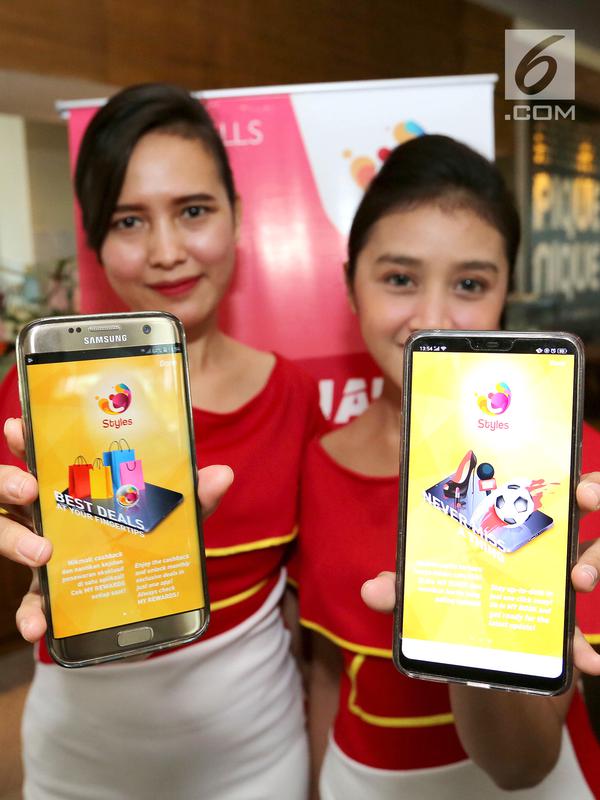 Model menunjukkan aplikasi Styles di Jakarta, Kamis (31/1). Styles dirancang khusus untuk memberikan pengalaman belanja yang menjangkau 70 mal sesuai dengan perubahan industri retail di era digital. (Liputan6.com)