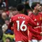Gelandang Manchester United, Mason Mount (kanan) dan Amad, merayakan gol pembuka dalam pertandingan Premier League melawan Sunderland di Old Trafford, Manchester, Sabtu (4/10/2025) malam. (Paul ELLIS / AFP)