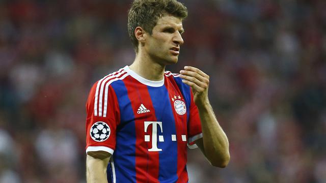 Thomas Mueller cetak gol ke gawang Barcelona (Reuters)