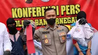 Polres Banjarnegara menetapkan dua pemeran video mesum gay atau sesama jenis sebagai tersangka. (Foto: Liputan6.com/Polda Jateng)