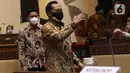 Menteri Dalam Negeri (Mendagri) Tito Karnavian bersiap mengikuti rapat dengar pendapat (RDP) dengan Komisi II di gedung DPR RI, Jakarta, Selasa (19/1/2021). Rapat tersebut membahas evaluasi pelaksanaan pemilihan kepala daerah (Pilkada) 2020 pada 9 Desember  lalu. (Liputan6.com/Angga Yuniar)