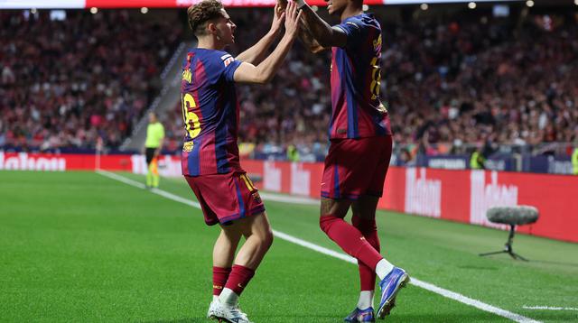 Marcus Rashford (kanan) berhasil mencetak gol ke gawang Atletico Madrid pada lanjutan Liga Spanyol 2025/2026 di Stadio Wanda Metropolitano, Madrid, Minggu (5/4/2026) dini hari WIB. (Pierre-Philippe MARCOU / AFP)