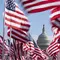 Capitol AS terlihat di antara bendera-bendera yang ditempatkan di National Mall menjelang pelantikan Presiden terpilih Joe Biden di Washington, Senin (18/1/2021). Acara pengambilan sumpah Joe Biden  akan berada dalam situasi berbeda dari pelantikan-pelantikan sebelumnya. (AP Photo/Alex Brandon)