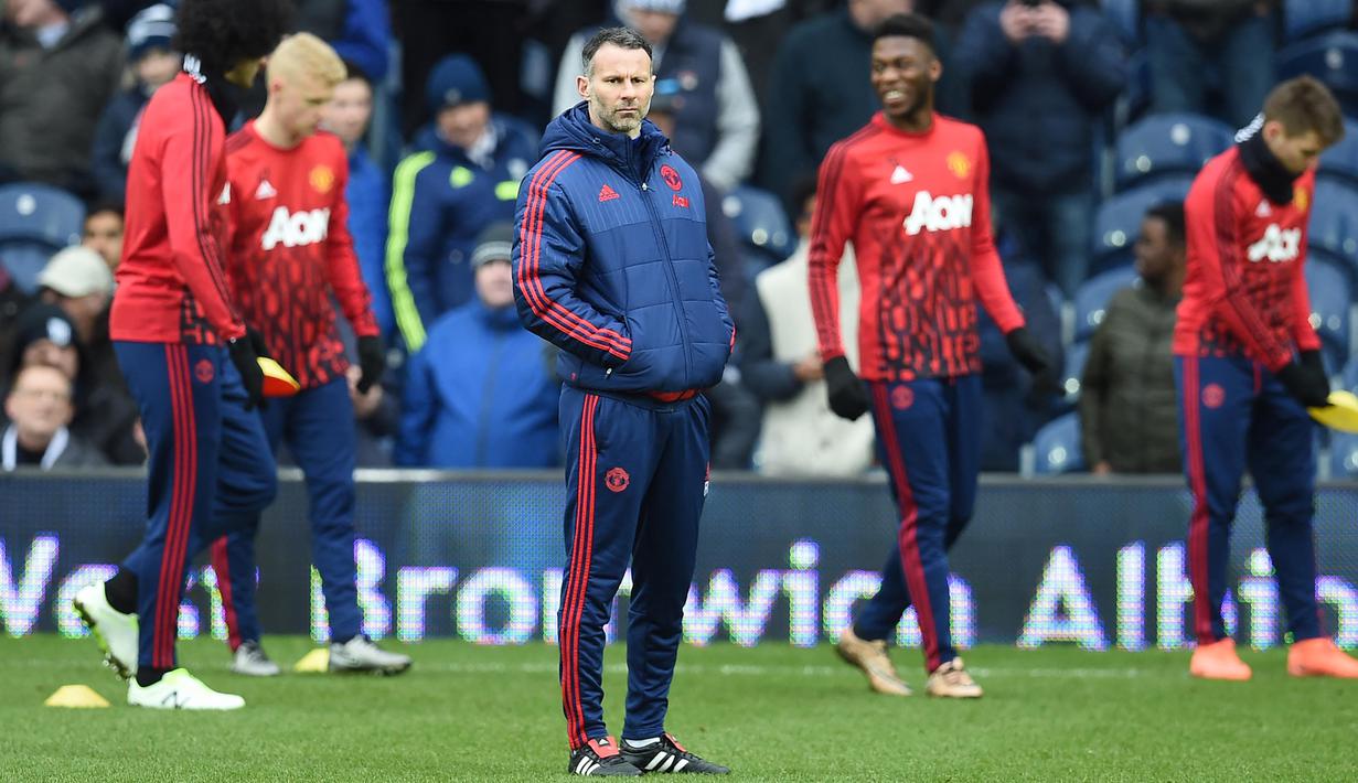 Pengalaman menangani Timnas Wales dan pernah dibesut pelatih sekaliber Sir Alex Ferguson, merupakan modal positif Ryan Giggs untuk menangani Manchester United. (AFP/Paul Ellis)