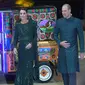 Pangeran William dan Duchess of Cambridge, Kate Middleton tiba menggunakan bajaj menghadiri acara yang diadakan Komisaris Tinggi Inggris untuk Pakistan di Islamabad, Pakistan (15/10/2019). Kunjungan Pangeran William dan Kate Middleton ini dalam rangka tur kunjungan kerja. (AFP/Aamir Qureshi)