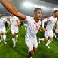 Para pemain Timnas Tunisia berselebrasi setelah memastikan lolos ke Piala Dunia 2022, pada 29 Maret 2022. (Fethi Belaid/ AFP)