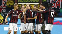 Carlos Bacca (unseen) celebrates with his team mates after scoring against Palermo during their Serie A soccer match at the San Siro stadium in Milan, Italy, September 19, 2015. REUTERS/Stefano Rellandini