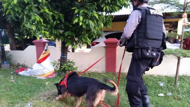 Polda Sulsel Siagakan Anjing Satwa K9 Selama Pilkada Berlangsung (Liputan6.com/ Eka Hakim)